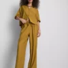 Pantalones de pierna ancha con textura arrugada