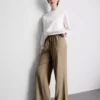 Pantalones de pierna ancha con textura arrugada