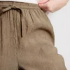 Pantalones de pierna ancha con textura arrugada