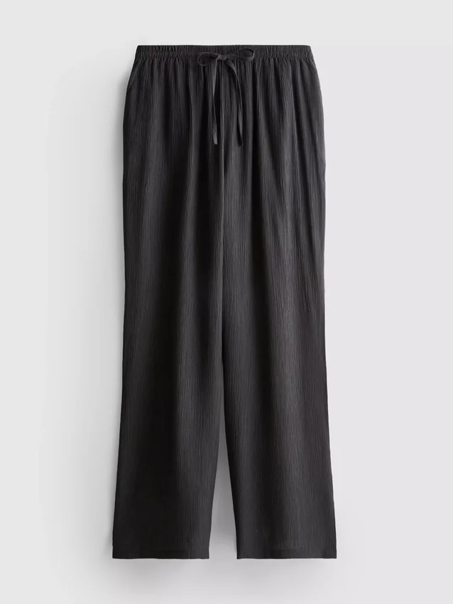 Pantalones de pierna ancha con textura arrugada