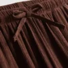 Pantalones de pierna ancha con textura arrugada