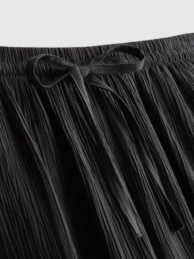 Pantalones de pierna ancha con textura arrugada