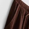 Pantalones de pierna ancha con textura arrugada