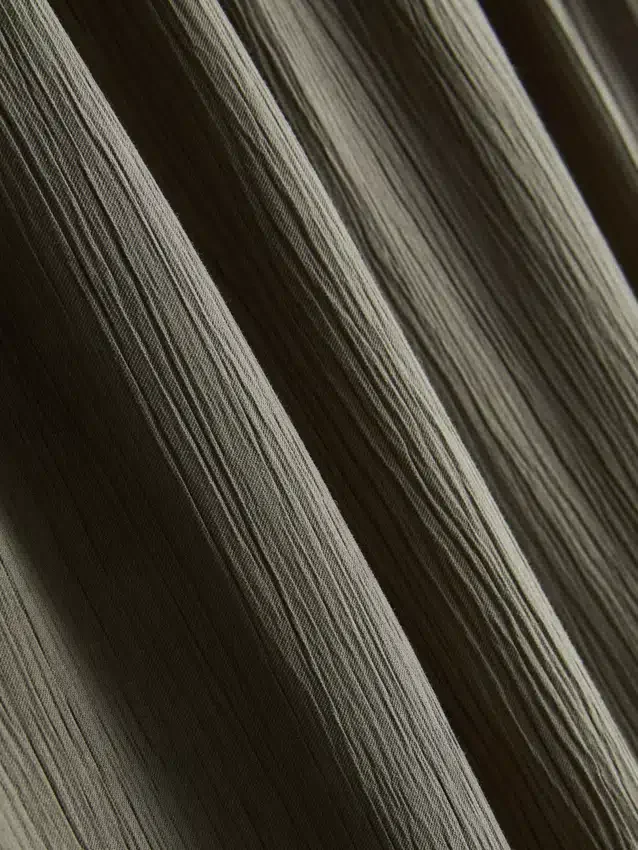 Pantalones de pierna ancha con textura arrugada