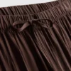 Pantalones de pierna ancha con textura y cordón