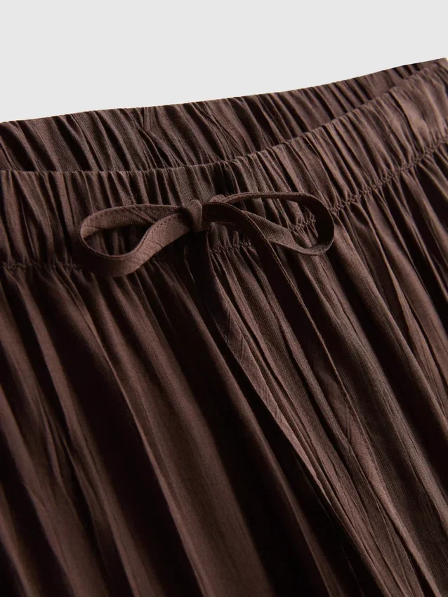 Pantalones de pierna ancha con textura y cordón