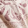 Pantalones de pierna ancha de satén arrugado de Paula Echevarría