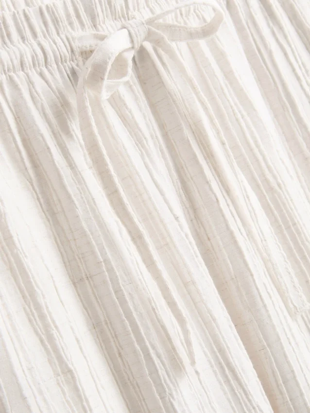 Pantalones de pierna recta arrugados