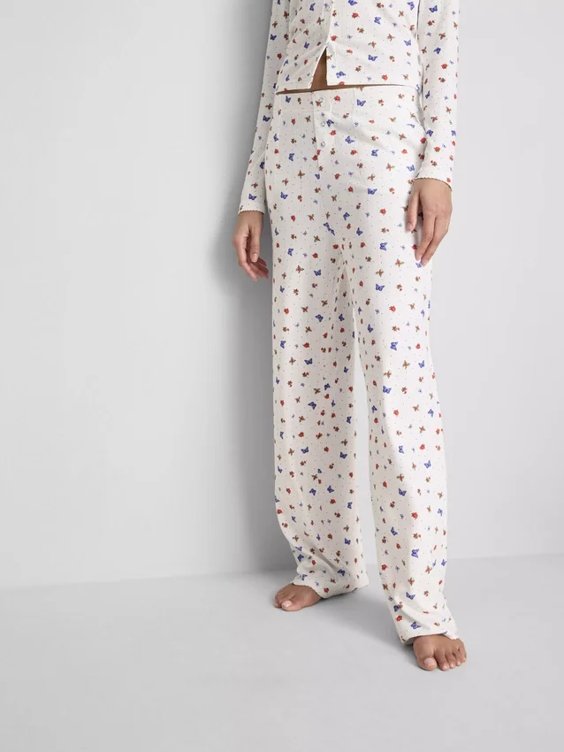 Pantalones de pijama acanalados con estampado de mariposas
