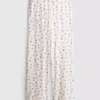 Pantalones de pijama acanalados con estampado de mariposas