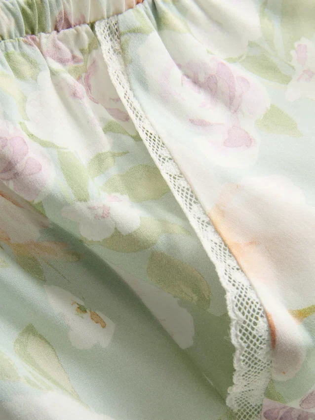 Pantalones de pijama de corte ancho con estampado floral