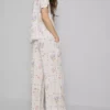 Pantalones de pijama de corte ancho con estampado floral
