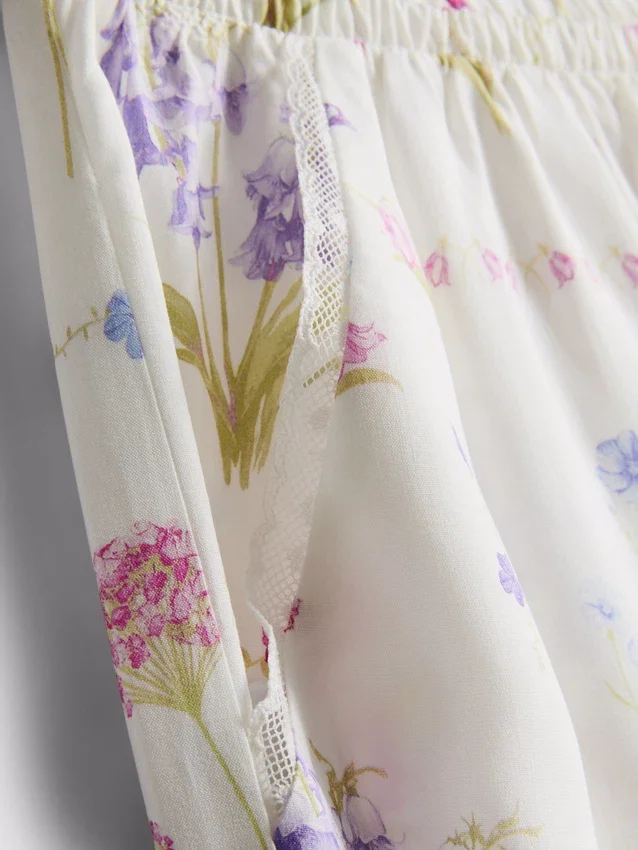 Pantalones de pijama de corte ancho con estampado floral