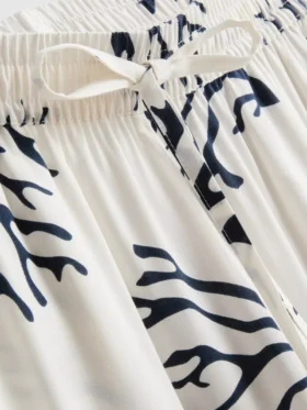 Pantalones de pijama de pierna ancha con estampado de coral