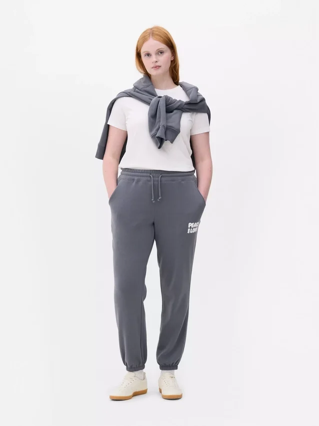 Pantalones de sudadera estampados con dobladillo