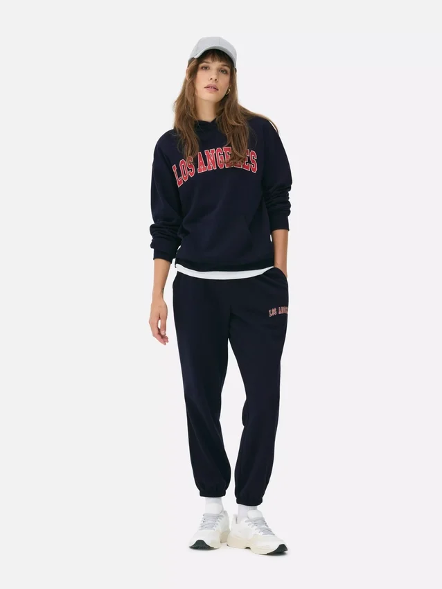 Pantalones de sudadera estampados con dobladillo