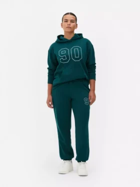 Pantalones de sudadera estampados con dobladillo