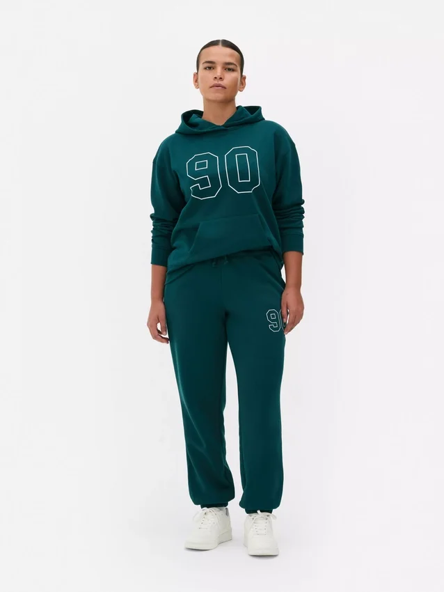 Pantalones de sudadera estampados con dobladillo
