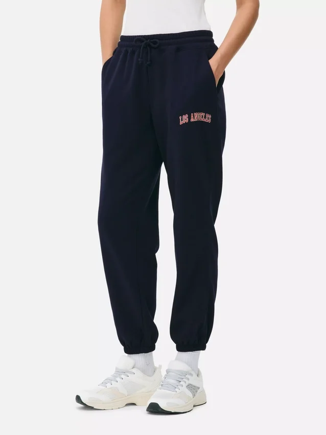 Pantalones de sudadera estampados con dobladillo