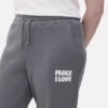 Pantalones de sudadera estampados con dobladillo