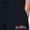 Pantalones de sudadera estampados con dobladillo