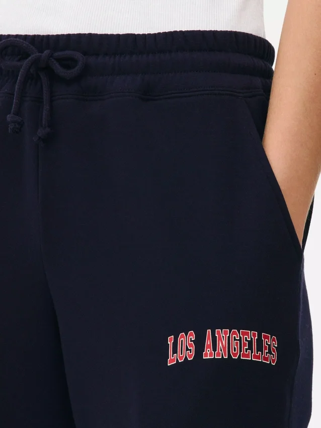 Pantalones de sudadera estampados con dobladillo