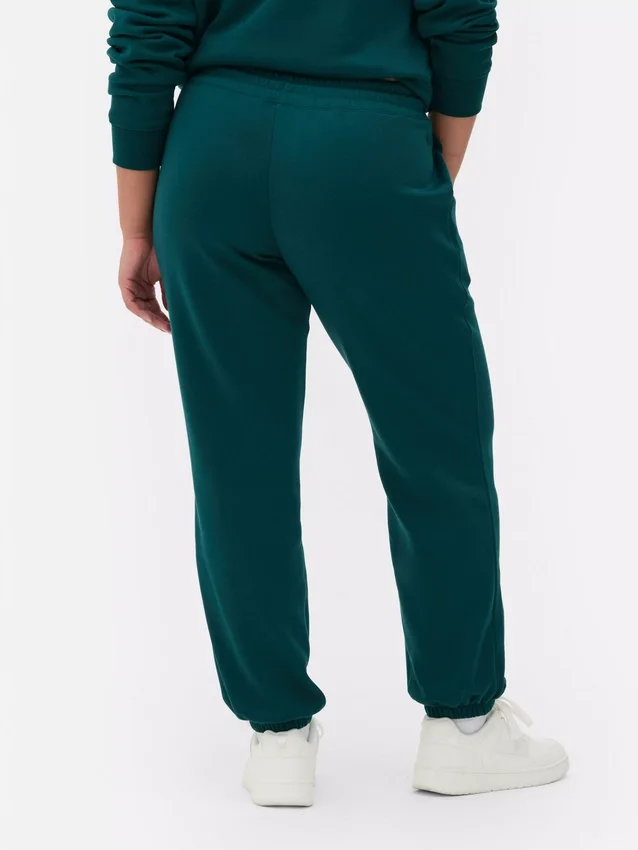 Pantalones de sudadera estampados con dobladillo