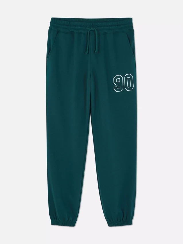 Pantalones de sudadera estampados con dobladillo