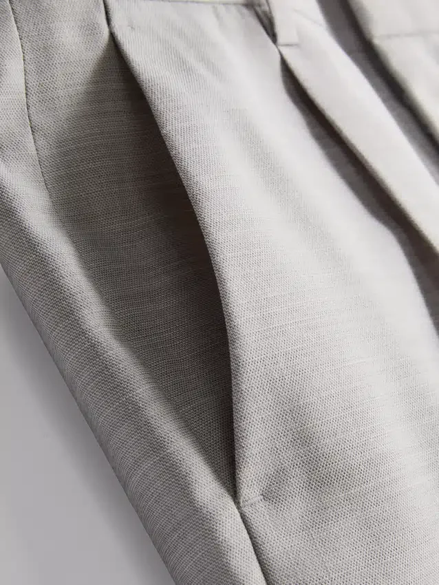 Pantalones de traje texturizados de corte regular