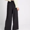 Pantalones elegantes de pierna ancha