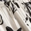 Pantalones estampados de pierna ancha