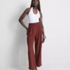 Pantalones holgados con textura y talle medio
