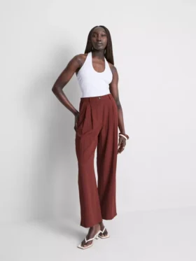 Pantalones holgados con textura y talle medio