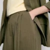 Pantalones holgados con textura y talle medio