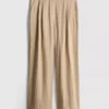 Pantalones holgados con textura y talle medio