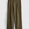 Pantalones holgados con textura y talle medio