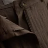 Pantalones holgados con textura y talle medio