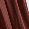 Pantalones holgados con textura y talle medio