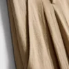 Pantalones holgados con textura y talle medio
