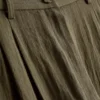 Pantalones holgados con textura y talle medio