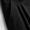 Pantalones holgados con textura y talle medio