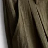 Pantalones holgados con textura y talle medio