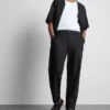 Pantalones holgados de mezcla de lino de The Edit