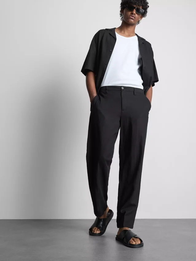 Pantalones holgados de mezcla de lino de The Edit