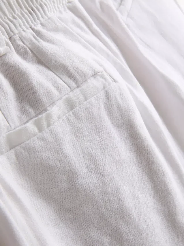 Pantalones holgados de mezcla de lino de The Edit