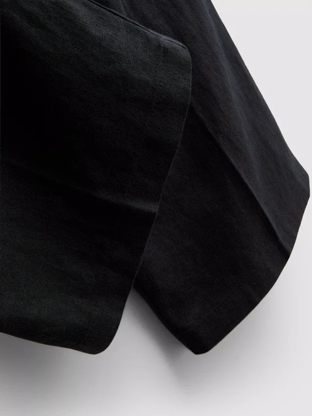 Pantalones holgados de mezcla de lino de The Edit