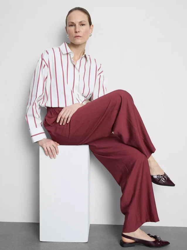 Pantalones palazzo con detalle de moño