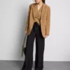 Pantalones palazzo con detalle de moño