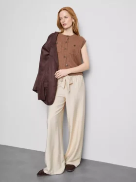 Pantalones palazzo con detalle de moño