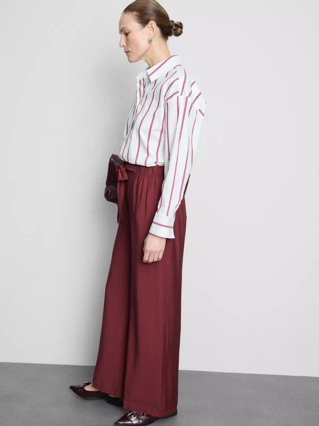 Pantalones palazzo con detalle de moño